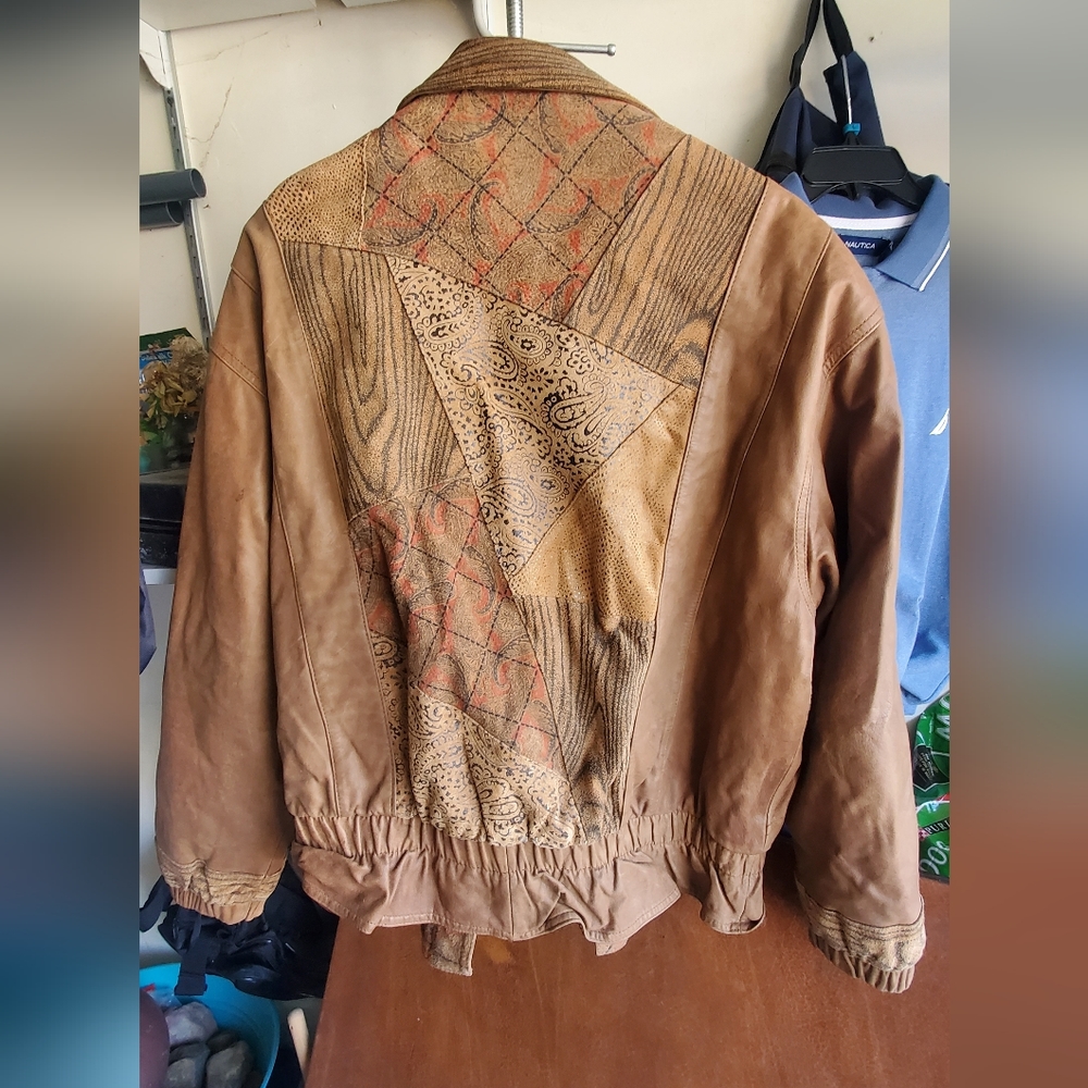 Brand: Cougar International leather coat Size: Large